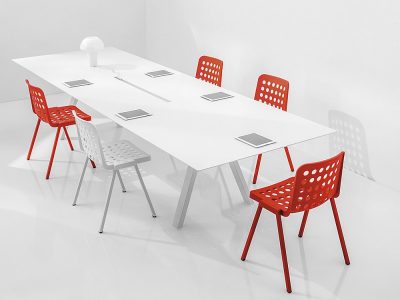 white conference table with red chairs